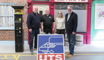 Photo of UTS Technologies management team with Claddagh Watch announcing sponsorship